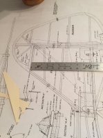 FIN - checking measurement on plan.jpg